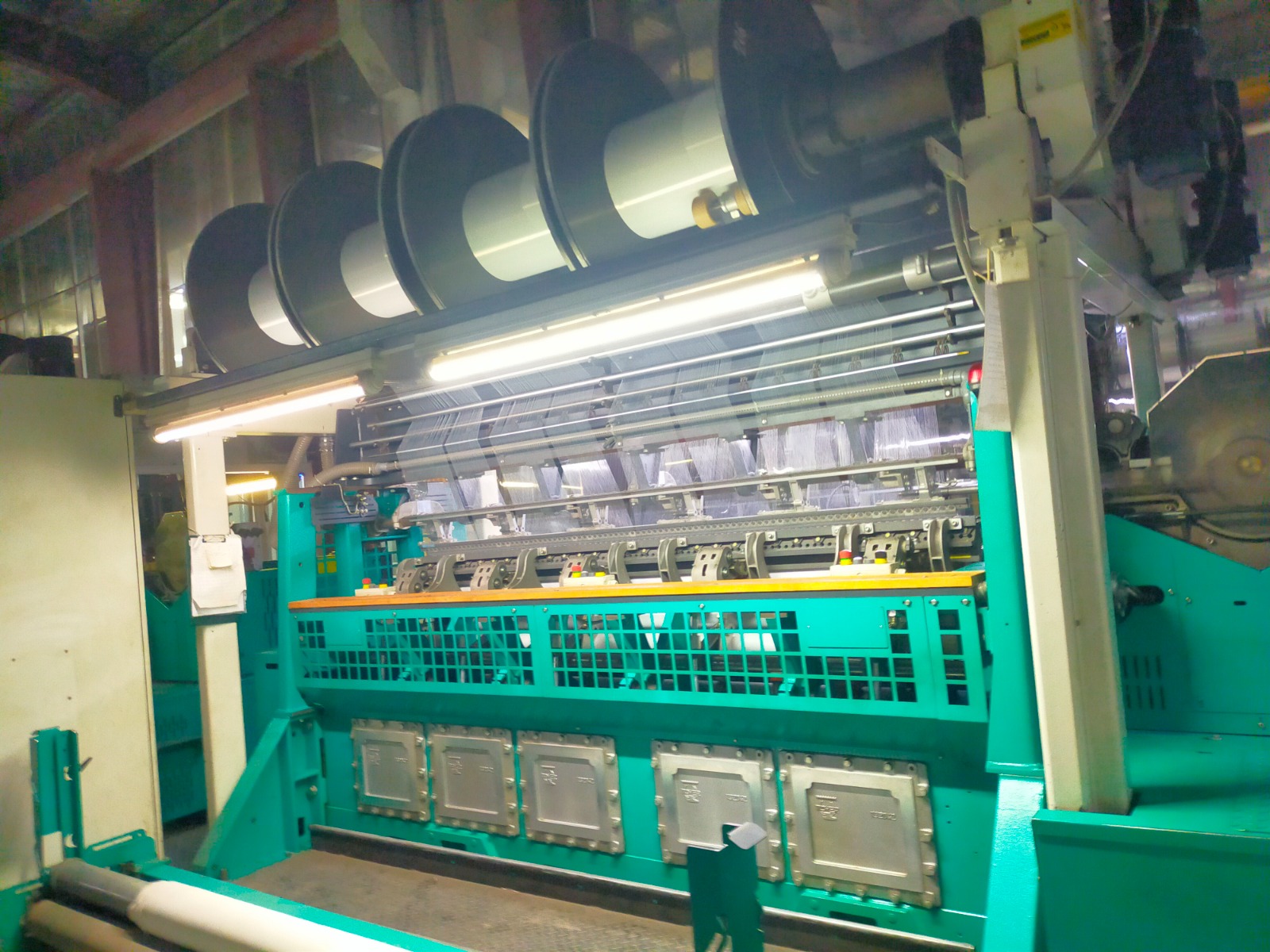 Weaving loom with warp beams at Islam Textile